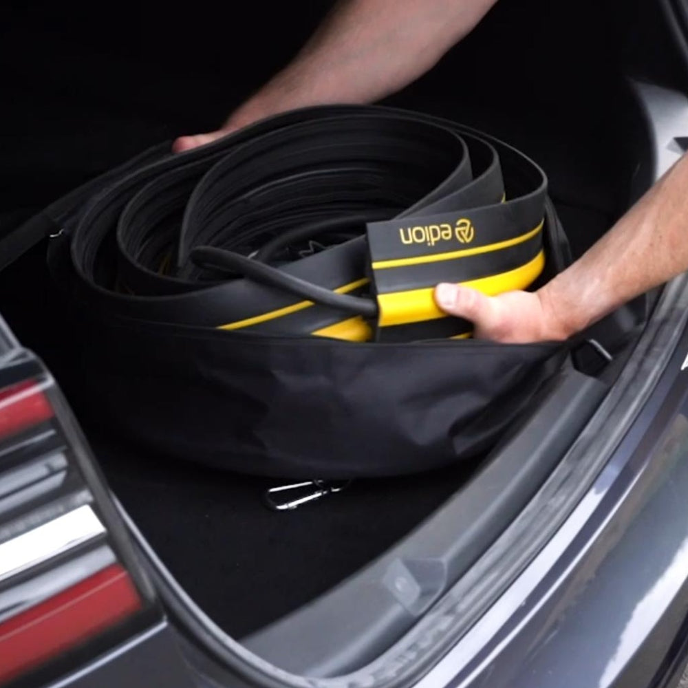 edion ev cable protector attached to charging cable stored in cable bag in boot